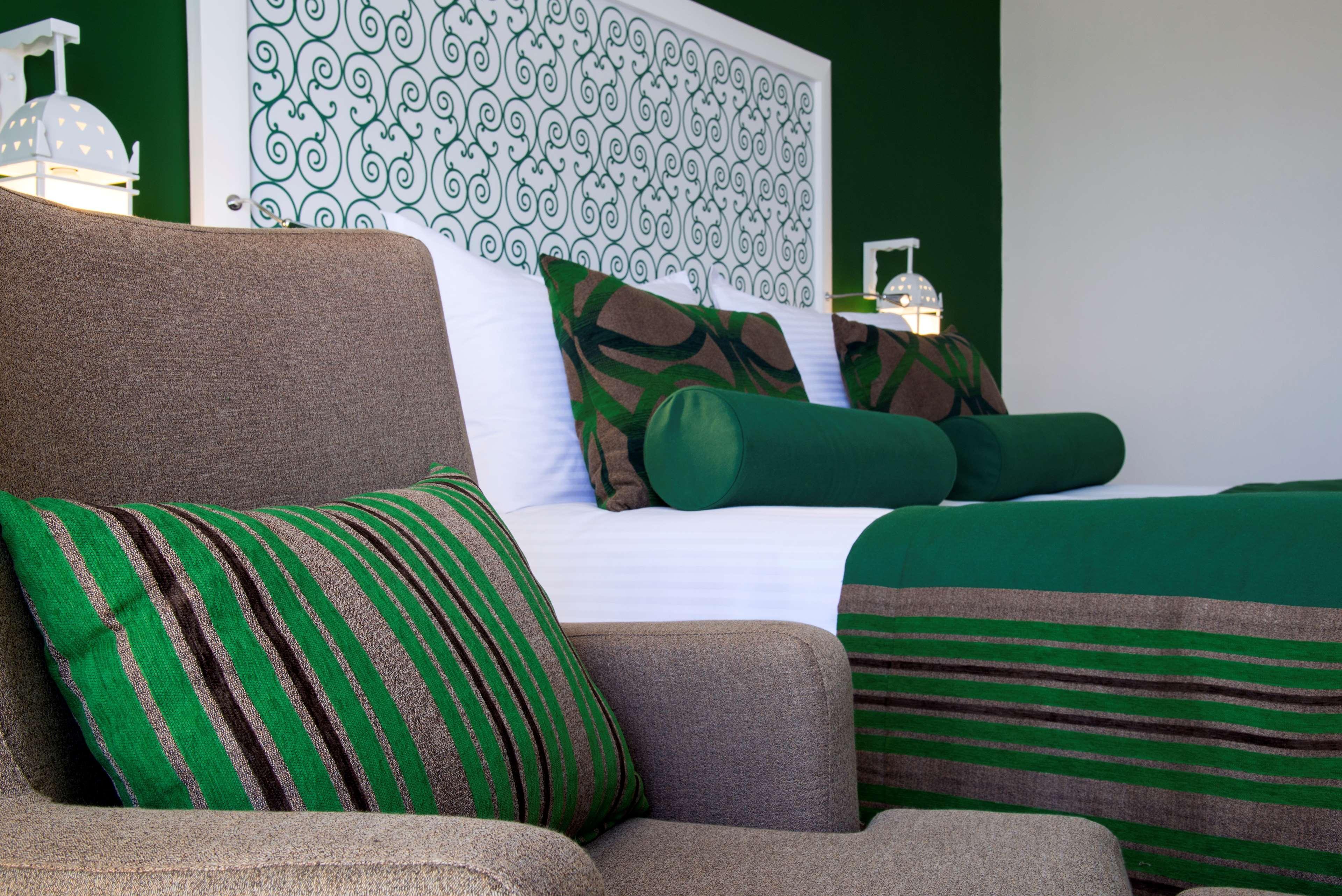 Radisson Blu Resort & Thalasso Hammamet Exterior photo A bed with cushions